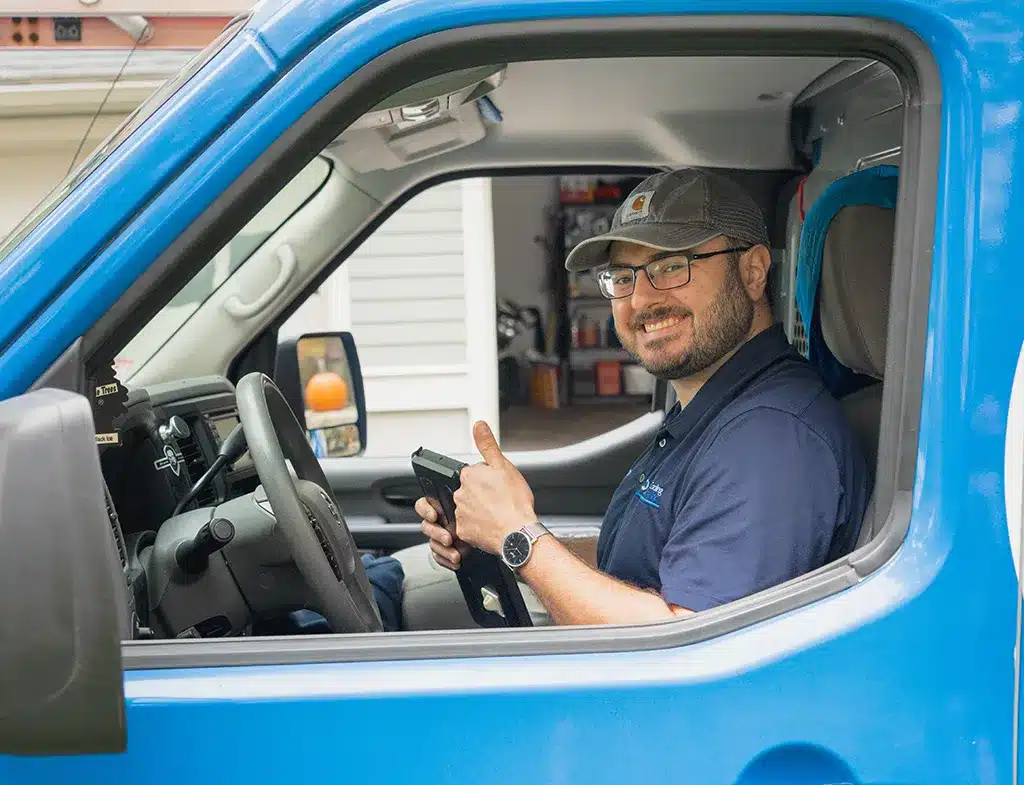 Central Cooling & Heating Employee in van